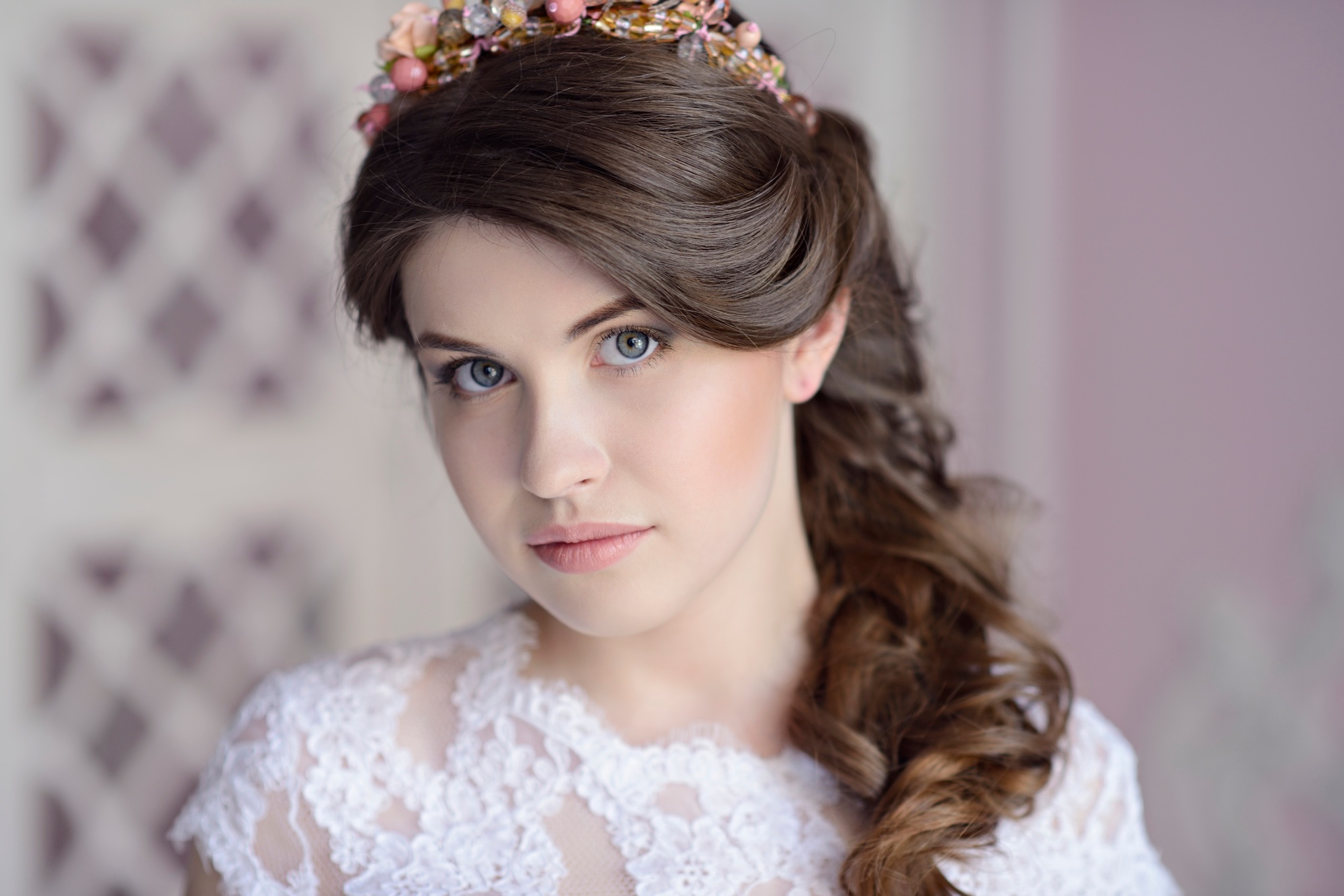 Beauty bride in bridal gown indoors