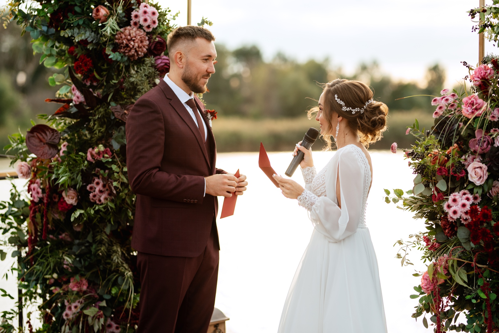 wedding ceremony of the newlyweds on the pier